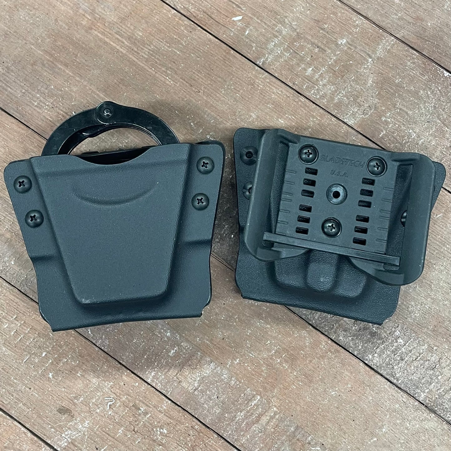 HANDCUFF HOLDER