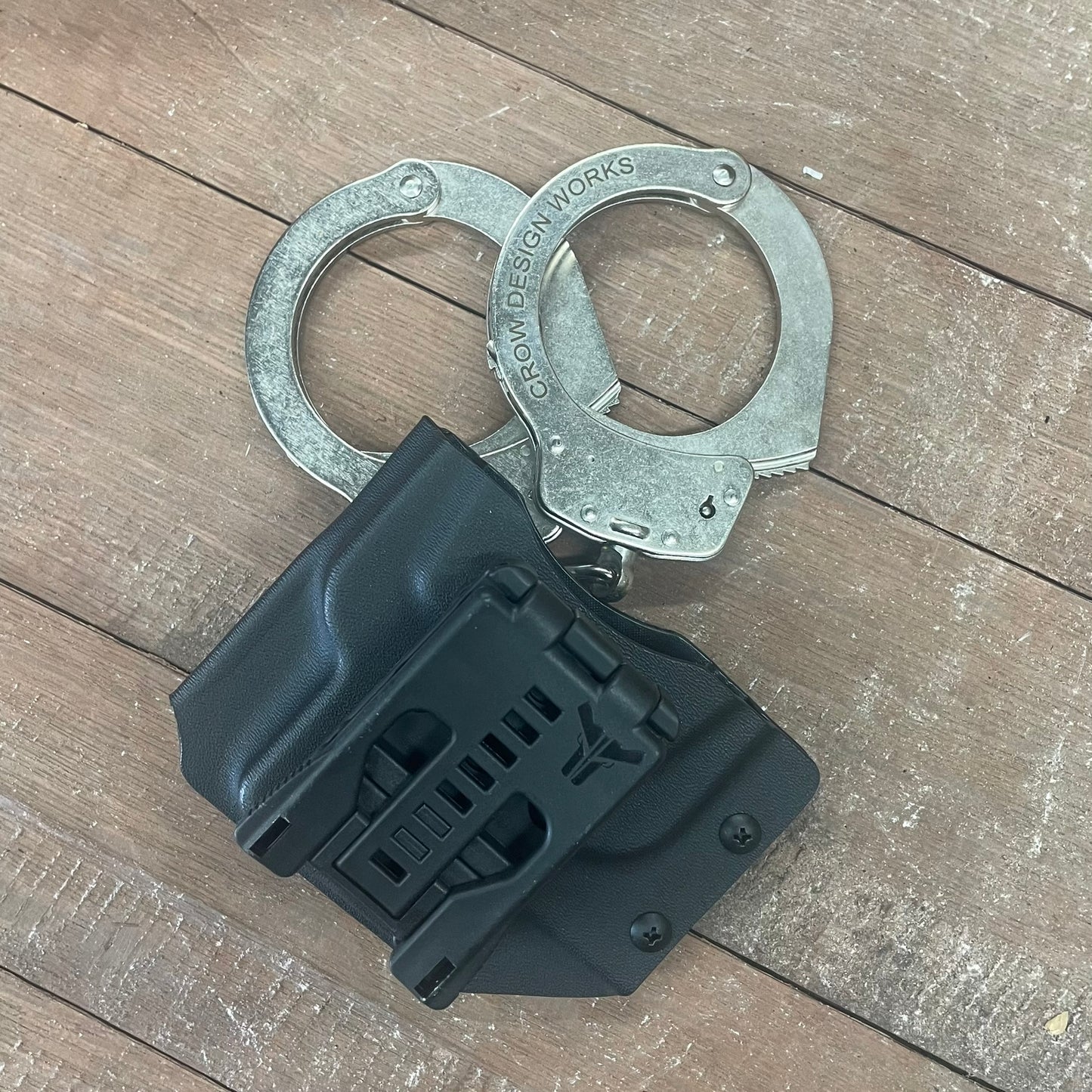 HANDCUFF HOLDER