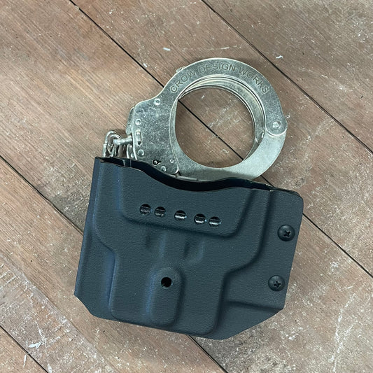 HANDCUFF HOLDER