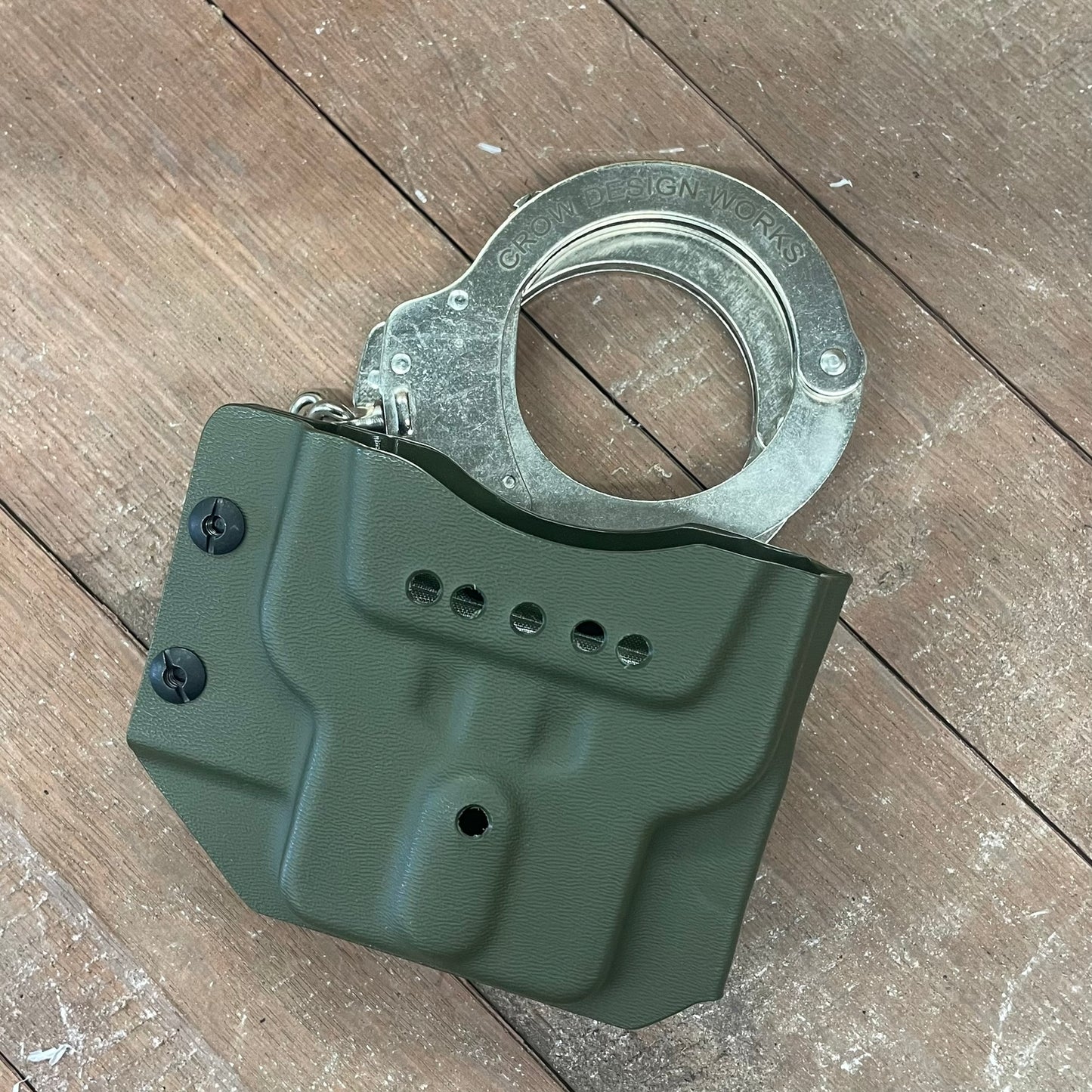 HANDCUFF HOLDER